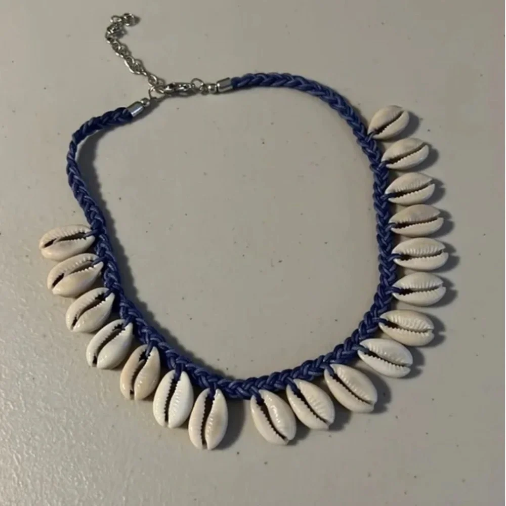 Cowrie Sea Shell Necklace on Blue Braided Cord Silvertone clasp w/ extender NWT